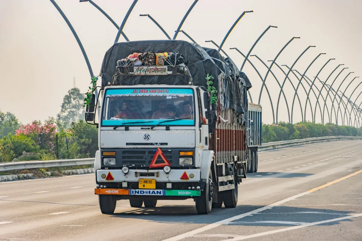 JK Express truck with covered load on an expressway